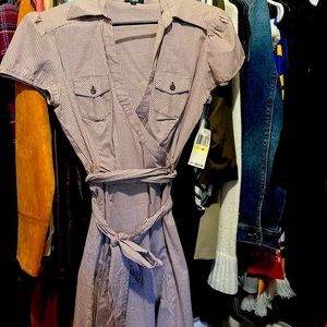 Cute dress with belt (can be worn on or off) New with tags never worn.